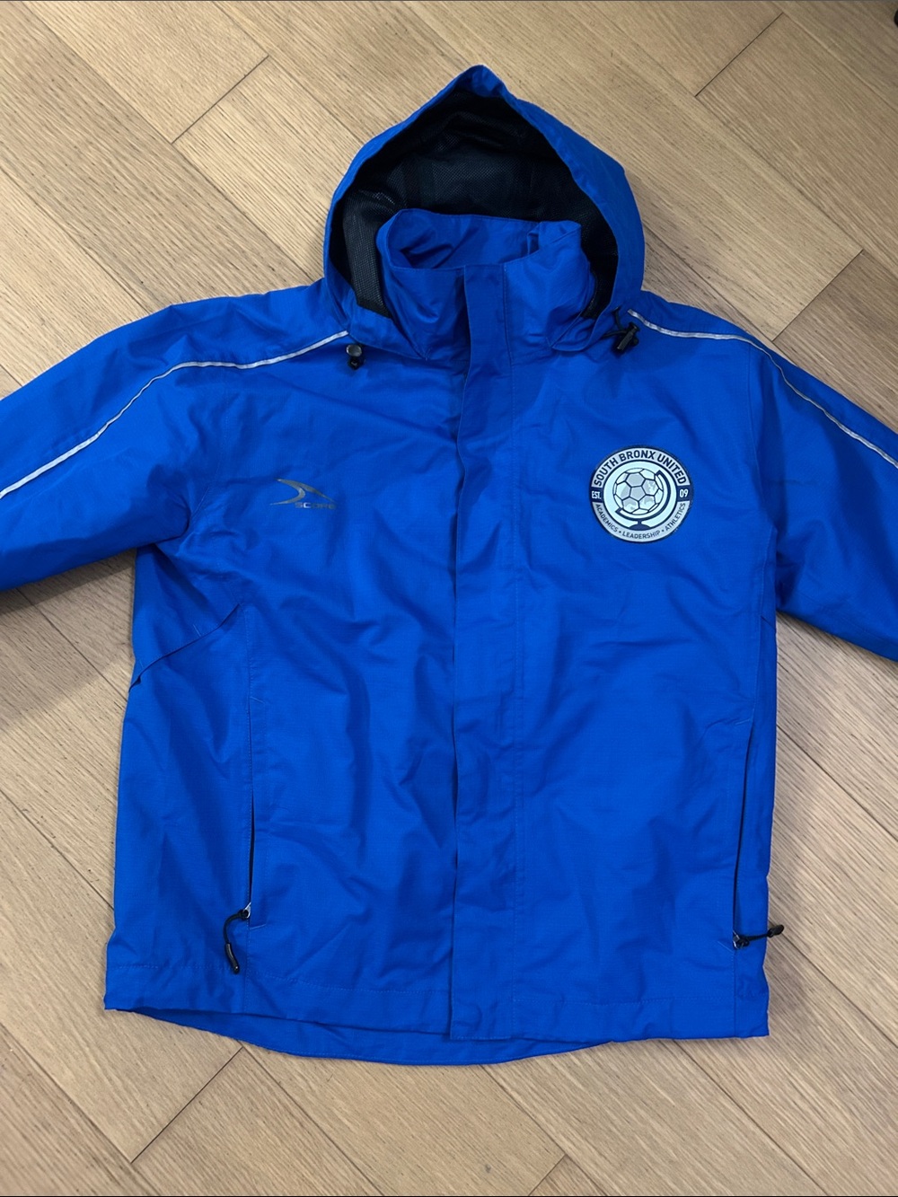 Royal Blue Hooded Windbreaker Jacket with Soccer Crest
